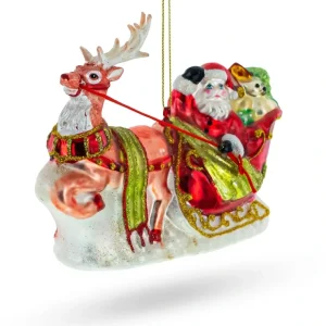 Santa Delivering Gifts On Sleigh - Blown Glass Christmas Ornament - CaringForTots - Professional Baby and Children's Products | Caring for Growth, Caring for Every Moment* Ornaments